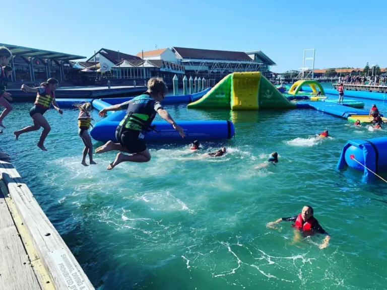 Kids swimming at island aqua park in Joondalup